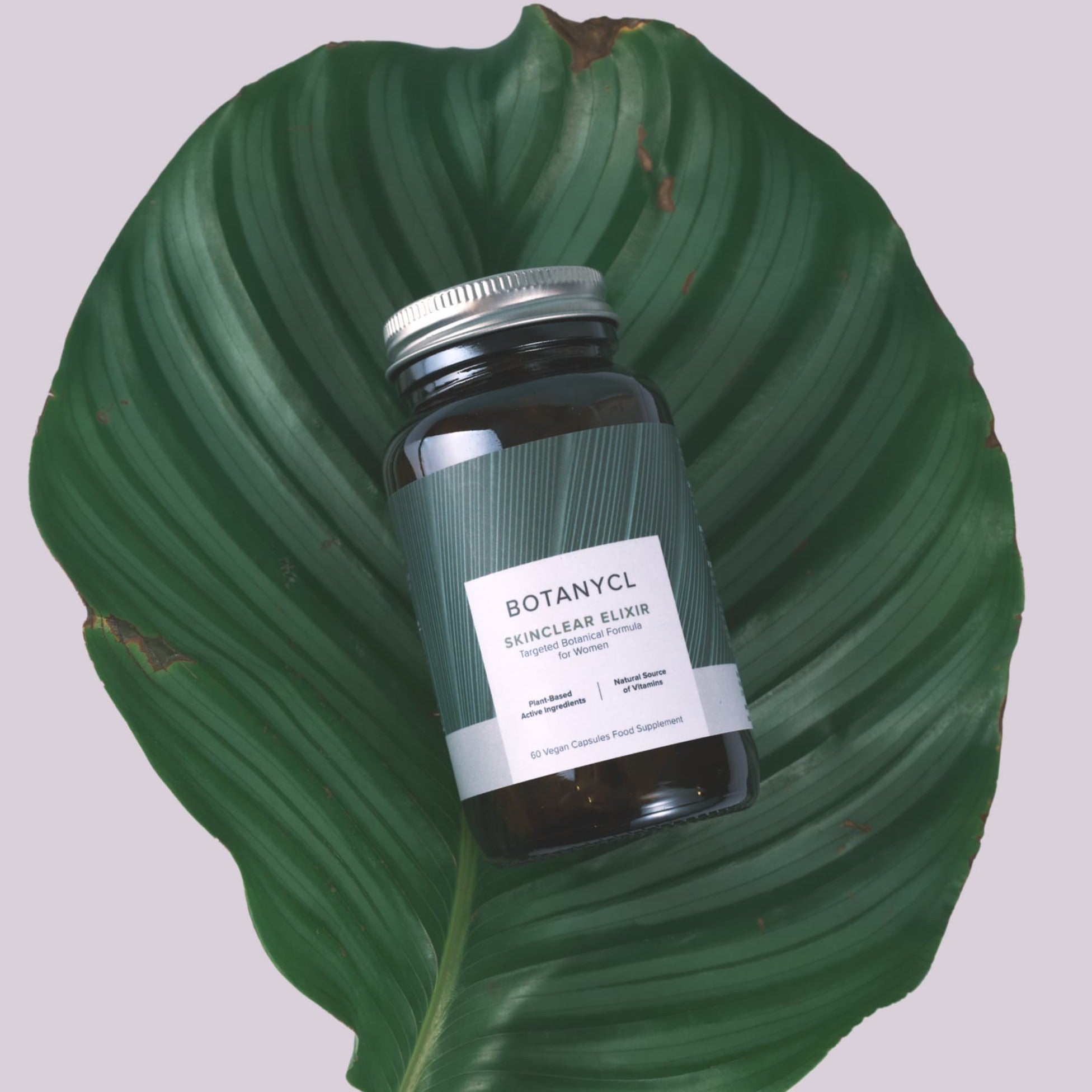 Botanycl SkinClear Elixir on a green leaf